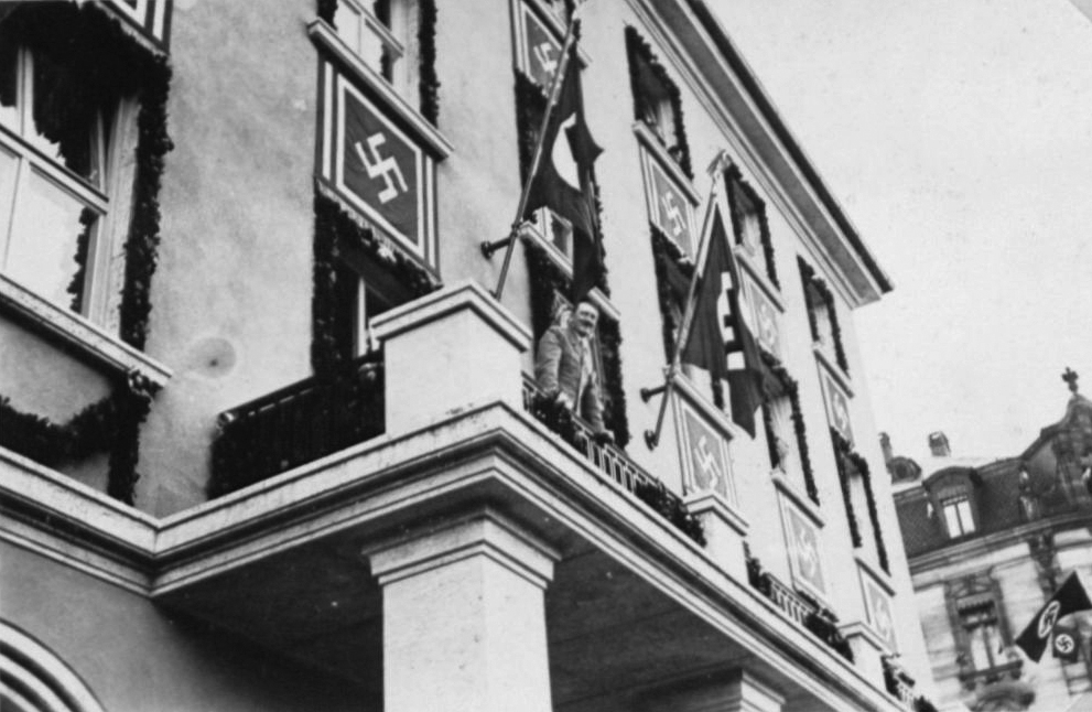 Adolf Hitler on the balcony of hotel Deutscher Hof in Nuremberg during the 1936 Reichsparteitag